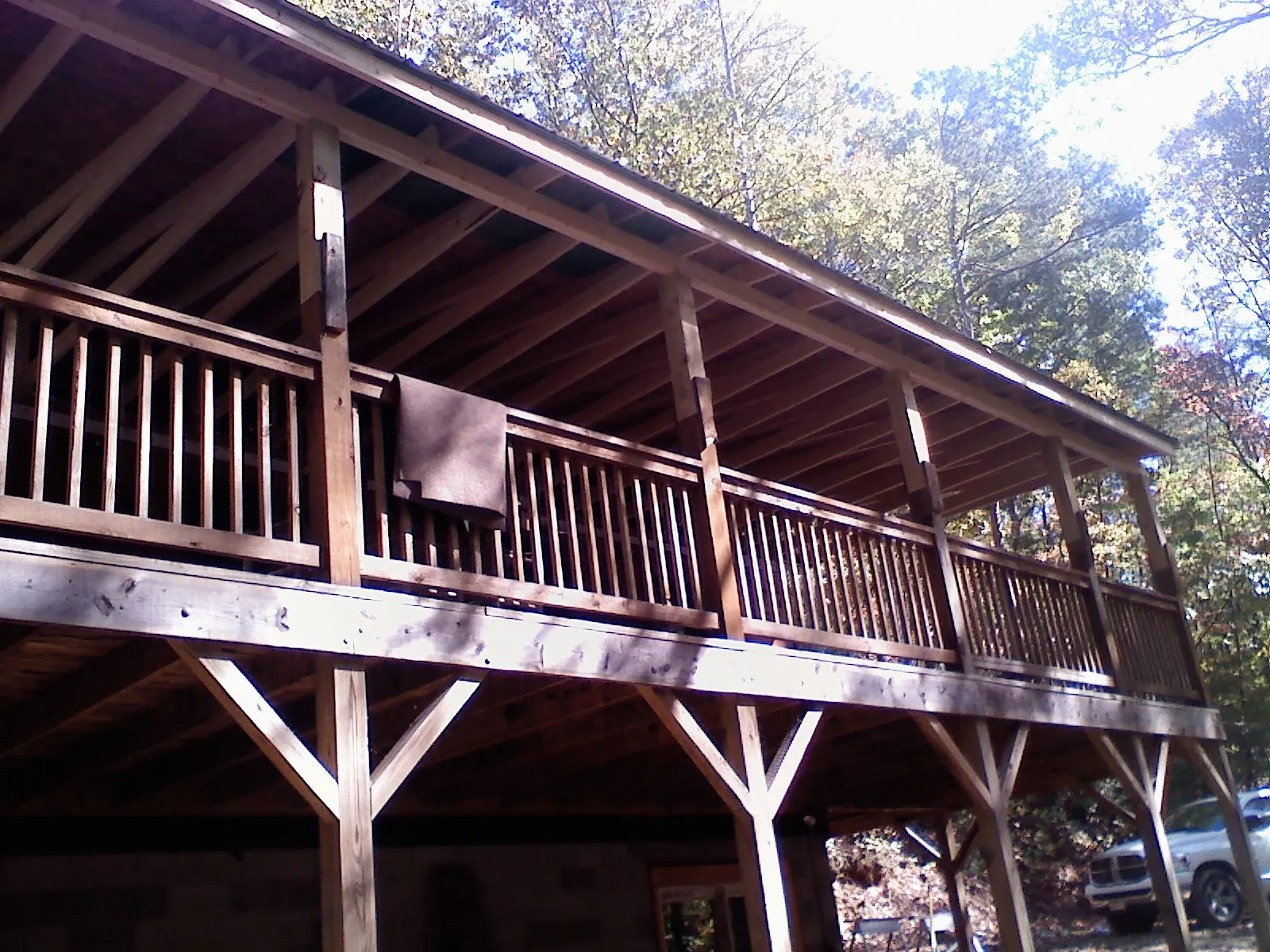 Timber framing under a new elevated porch and deck — Roof Leak Repair in Sinai by Roofing Brothers
